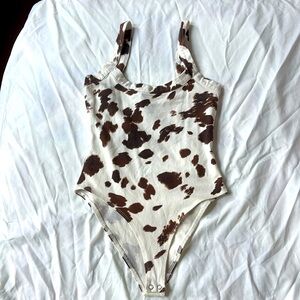 NEVER WORN Cow Print Forever 21 Bodysuit size small